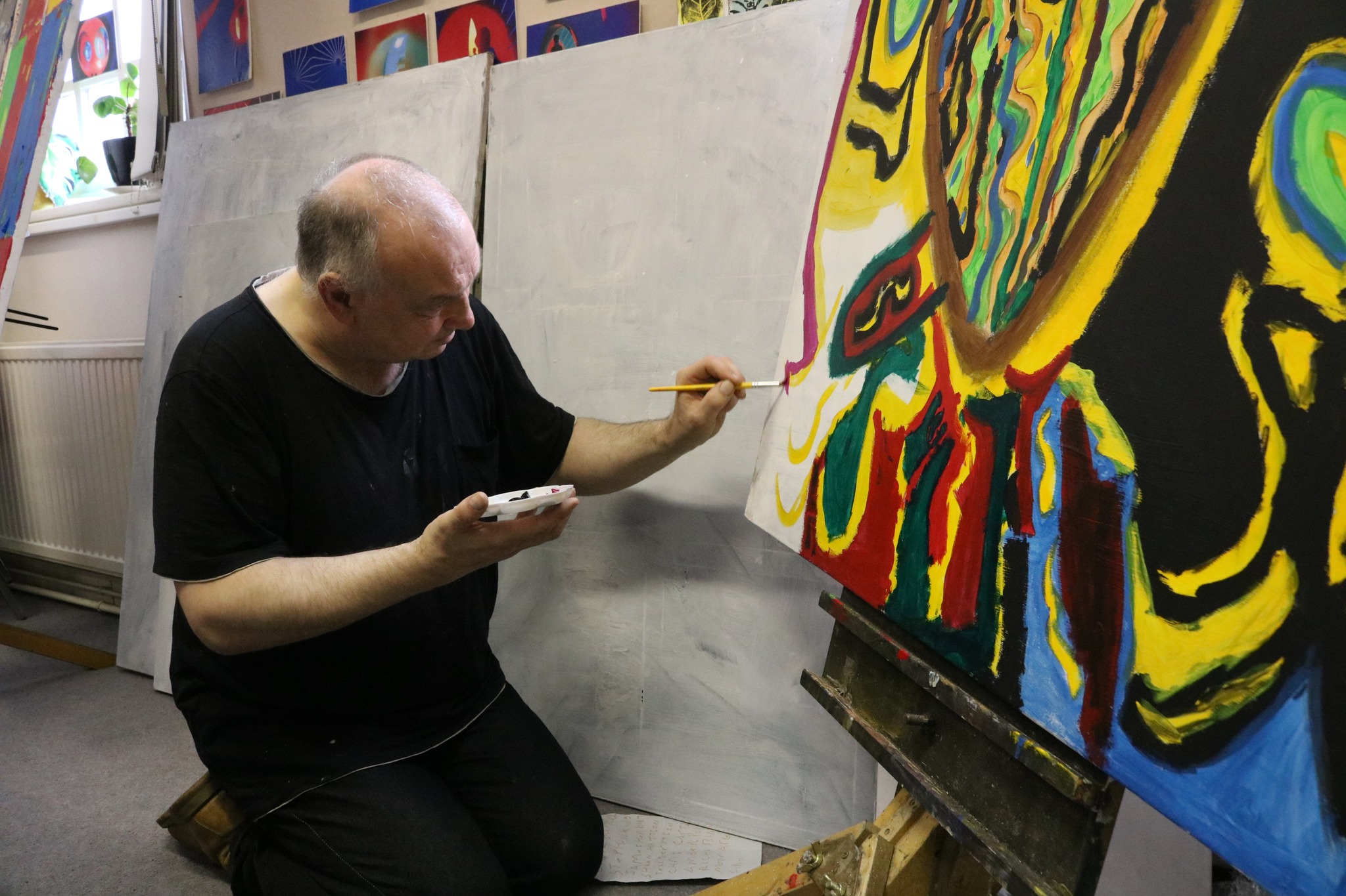 Patrick working on one of his pieces for the exhibition